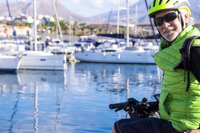 Portrait of senior man sitting on jet boat