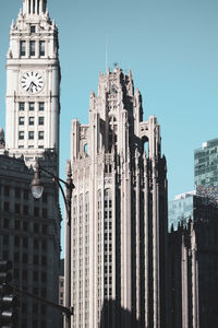 Low angle view of buildings against clear sky