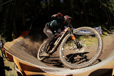 Man riding bicycle in park