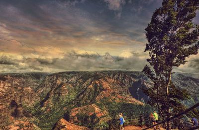 Scenic view of landscape against cloudy sky