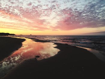 Scenic view of beach during sunset