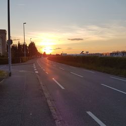 Road against sky during sunset