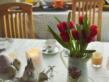 High angle view of tulips in vase on table
