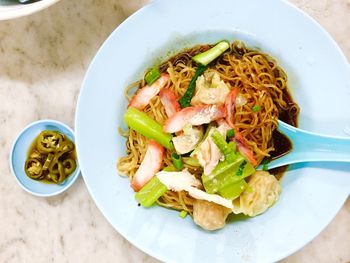 Directly above shot of noodles in bowl on table