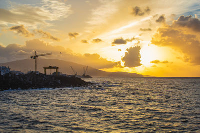 Scenic view of sea against sky during sunset