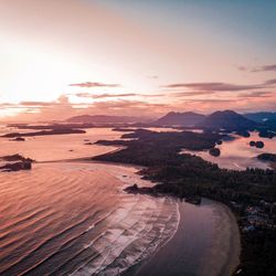 High angle view of lake against sky during sunset, tofino beach vancouver island from above