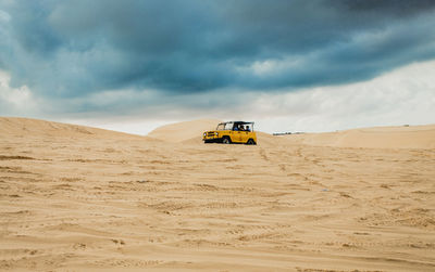 Scenic view of desert against sky