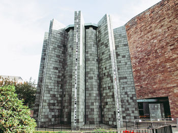 Low angle view of modern building against sky