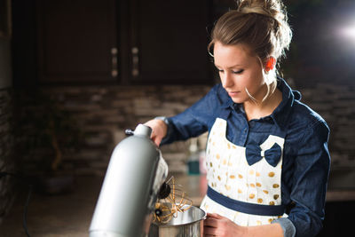 Young woman preparing food