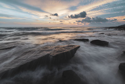 Scenic view of sea against sky during sunset