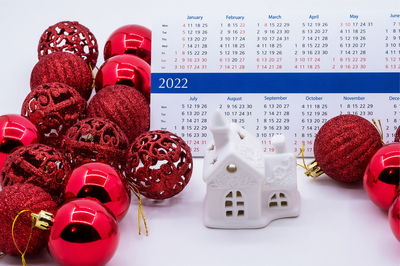 Calendar 2022 and christmas decorations. planning for next year. notebook, new year's celebration.