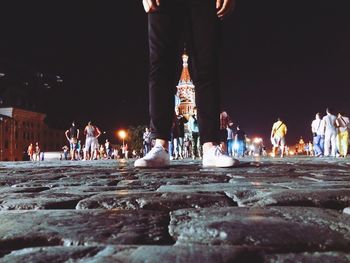 View of illuminated people at night