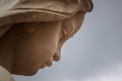 Close-up of statue against sky