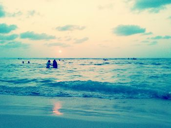 Scenic view of sea against cloudy sky