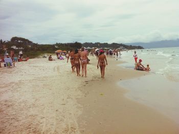 People enjoying at beach