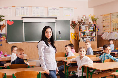 Group of people sitting on table