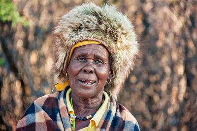 Portrait of a smiling young woman outdoors