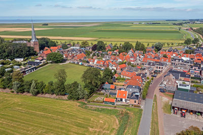 Aerial from the village holwerd aan zee in friesland the netherlands