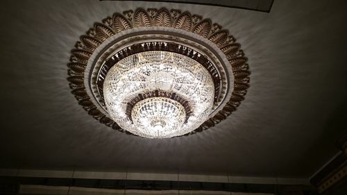 Low angle view of illuminated chandelier