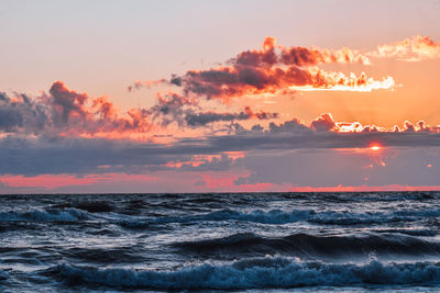 Scenic view of sea against sky during sunset