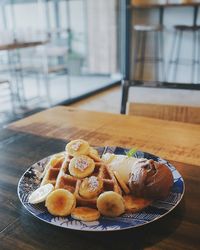 Close-up of food in plate on table