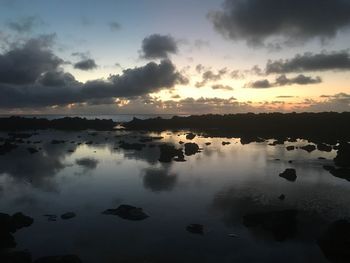 Scenic view of lake against sky during sunset