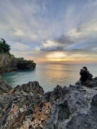 Scenic view of sea against sky during sunset