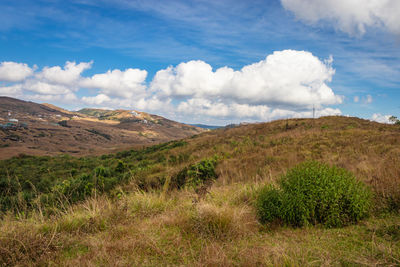 Countryside mountainous landscape with bright blue sky at morning from flat angle