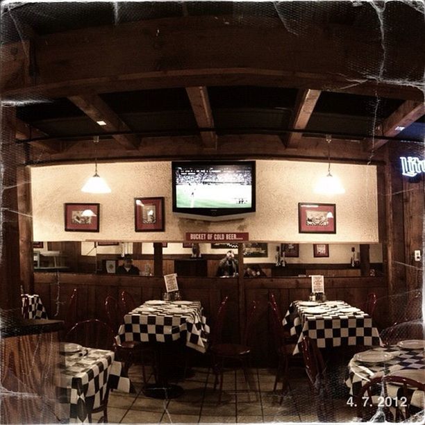 indoors, chair, illuminated, text, table, restaurant, architecture, interior, built structure, communication, absence, store, retail, empty, seat, non-western script, sitting, western script, window, men