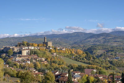 Aerial view of townscape against sky