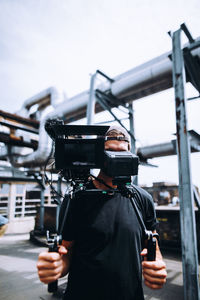 Man photographing with camera