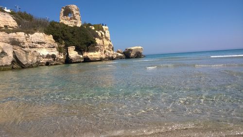 Scenic view of sea against clear sky