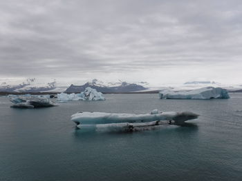 Scenic view of frozen sea against sky