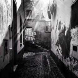 Narrow alley amidst buildings