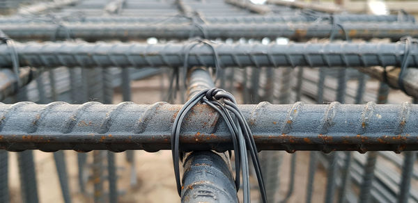 Close-up of padlock on bridge
