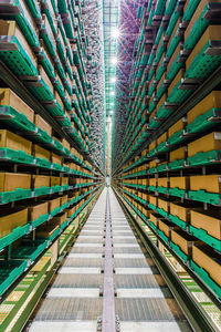 High angle view of automated warehouse. boxes put in the pallet in shelf rack in warehouse.