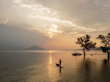 Scenic view of sea at sunset