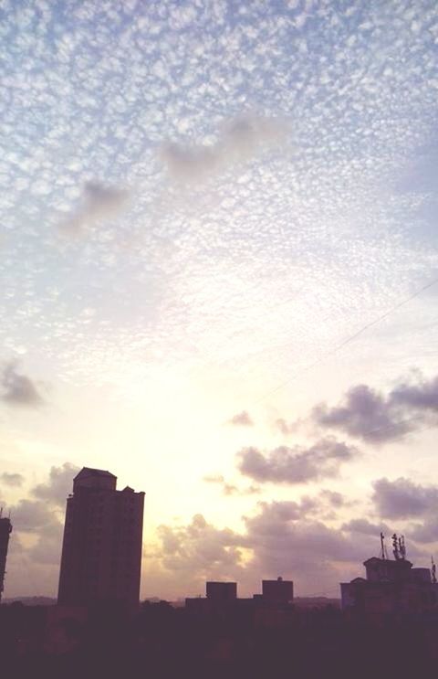 silhouette, building exterior, architecture, sunset, sky, built structure, cloud - sky, city, low angle view, cloud, cloudy, building, cityscape, skyscraper, outdoors, dusk, nature, no people, outline, beauty in nature