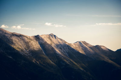 Scenic view of mountain against cloudy sky