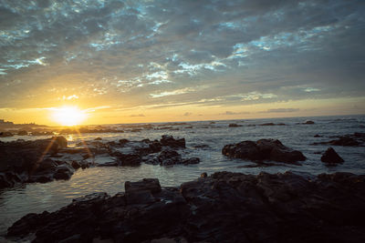 Scenic view of sea against sky during sunset