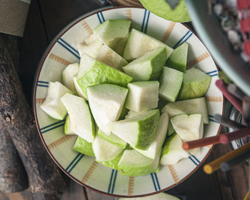 High angle view of chopped vegetables on table