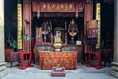 Buddha statue in temple outside building