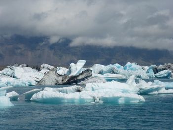 Scenic view of frozen sea against sky