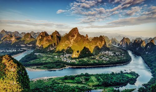 Panoramic view of river against sky during sunset