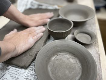 Cropped hands of man preparing food