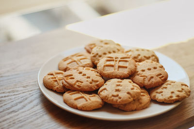 High angle view of cookies in plate on table
