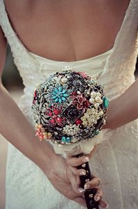 Midsection of woman holding artificial bouquet