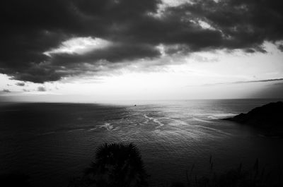 Scenic view of sea against sky at dusk