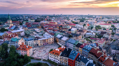 Aerial view of cityscape against sky