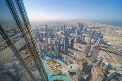 Cityscape seen from burj khalifa against clear sky